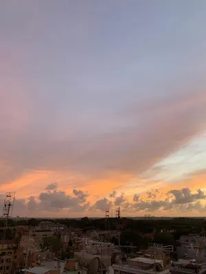 a view of a city at sunset at Loft Panoramico San Giovanni in Rome