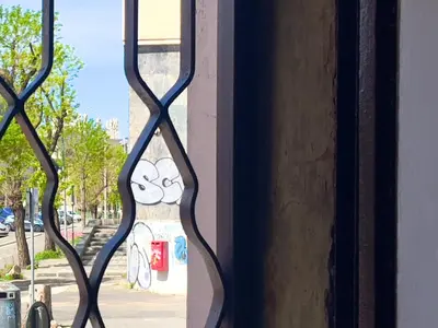 a window with a view of a street at Z-ArchSuites Urbs in Rome