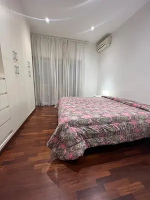 a bedroom with a bed in a room at Goiran@4 in Rome