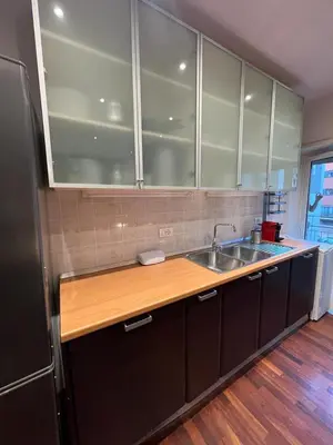 a kitchen with a sink and a counter top at Goiran@4 in Rome