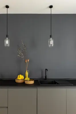 a kitchen with a sink and some fruit on a counter at iFlat Sunny & Brand New Apartament near Vatican in Rome