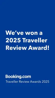 a blue sign that says weve won a traveler review award at Casa Greco - Attico con terrazza, Trastevere in Rome