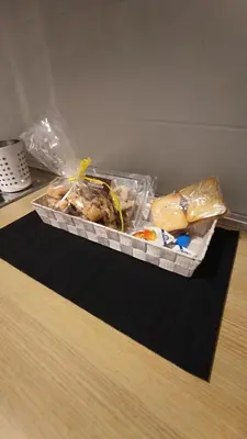 a box of food sitting on a table at Casilina One in Rome