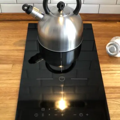 a tea pot sitting on top of a stove at Panorama suites & flats in Rome