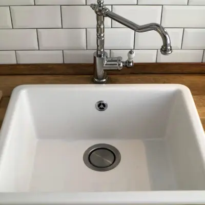 a white sink with a faucet in a kitchen at Panorama suites & flats in Rome