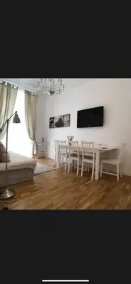 a living room with a dining room table and chairs at Panorama suites & flats in Rome
