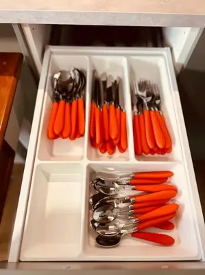 a white tray filled with carrots and other utensils at Luxury apartment Balduina - Casa di Irene in Rome