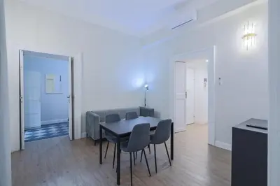 a dining room with a table and chairs at Casa Prefetti 46 B in Rome