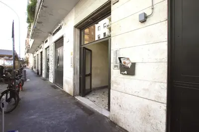 an empty alley with bikes parked on the side of a building at Piramide Holiday House in Rome