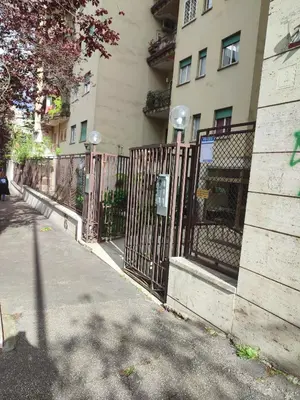 a wrought iron fence in front of a building at Da Licia in Rome