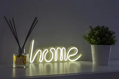 a neon sign that says mum next to a plant at Imperium House - appartamento con giardino privato, 3 minuti da Metro Piazza Bologna, A-C, in Rome