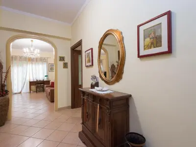 a room with a mirror on the wall and a hallway at Apartment Vaticanum Hills by Interhome in Rome