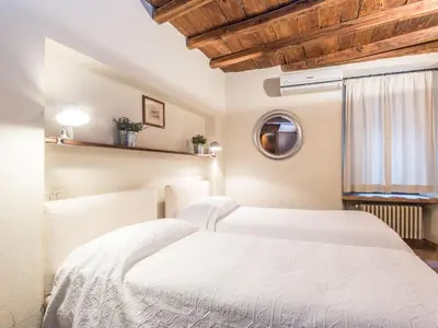 a bedroom with two beds and a window at Apartment Augustus by Interhome in Rome