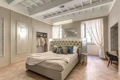 a bedroom with a large bed in a room at White Miracle Suite in Rome