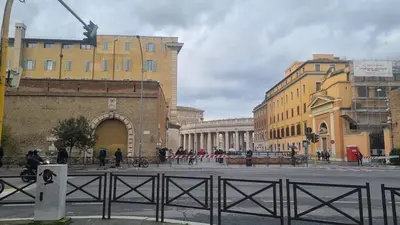 a group of buildings in a city with a fence at Ad un passo dal Vaticano in Rome