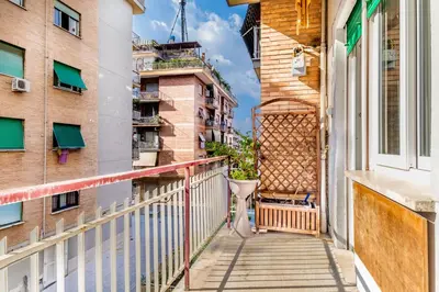 a balcony with a view of a building at BBHOME Tiburtina Station apartment in Rome