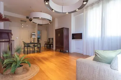 a living room with a couch and a table at Oasis Rome Centre Apartment in Rome