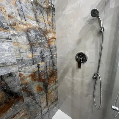 a shower in a bathroom with a glass door at Ele Suites Pantheon in Rome