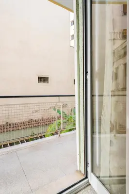an open window with a view of a building at Luigi's Home, Cozy Apartment Metro San Paolo in Rome