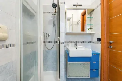 a bathroom with a shower and a sink at Luigi's Home, Cozy Apartment Metro San Paolo in Rome