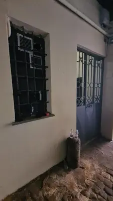 a room with a door and a window and a wall at Hybris Campo De' Fiori in Rome