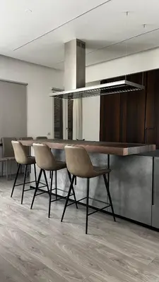 a dining room with a long table and chairs at Galileo Luxury Terrace Suites Rome in Rome