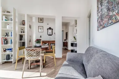 a living room with a couch and a table at Casa Caracciolo Roma Vaticano in Rome