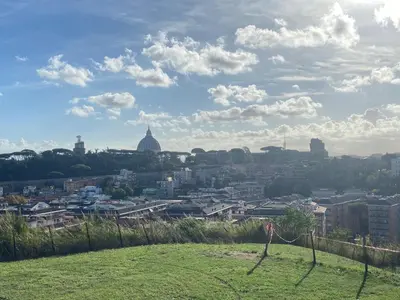 a view of a city from a hill at Blessy apartment Vaticano in Rome