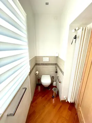 a small bathroom with a toilet in a room at Via Umbria 25 Luxury Suites in Rome