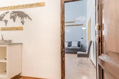 a mirror in a living room with a couch at Vatican Blue Sky in Rome