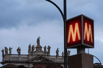 a mcdonalds sign in front of a building at Roma in Relax Lovely Loft in the center of Rome Fabrizia in Rome