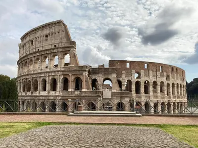 a building that looks like the coliseum at Casa Blu Testaccio in Rome