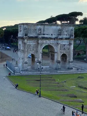 a building with an arch in a park at Casa Blu Testaccio in Rome