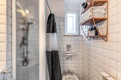 a bathroom with a shower and a sink at Terrazza Ippocrate in Rome
