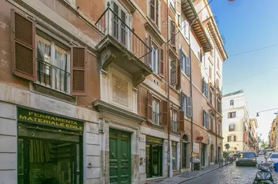 a street in a city with buildings at Trevi Little Palace #9 in Rome