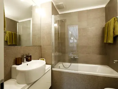 a bathroom with a sink and a shower and a tub at Antiche Residenze Romane Navona in Rome