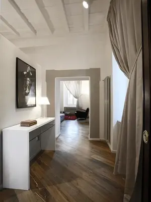 a white room with a desk and a hallway at Antiche Residenze Romane Navona in Rome