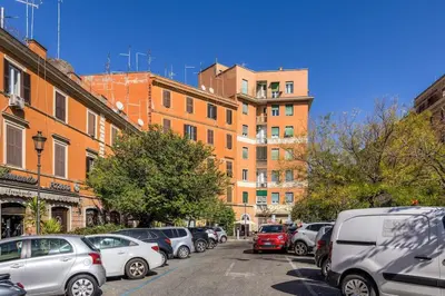 a bunch of cars parked in a parking lot at Magenta Tiburtino in Rome
