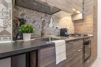 a kitchen with a sink and a counter top at BND Boutique Gemelli Vaticano in Rome