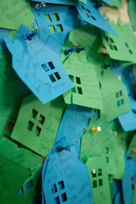 a pile of pieces of paper with houses on it at B&B Casetta Roma in Rome