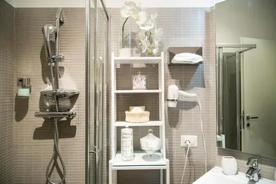 a bathroom with a shower and a sink at B&B Casetta Roma in Rome