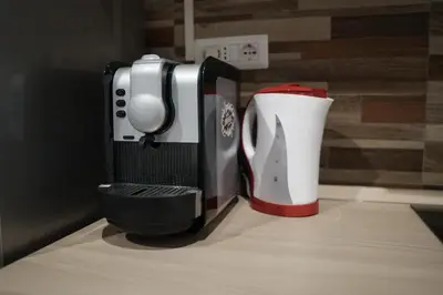 a coffee maker sitting on top of a counter at Residenza Bernini in Rome