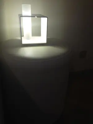 a light on a table in a dark room at L'Appartamento Romano in Rome
