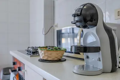a mixer sitting on a counter in a kitchen at La CASA DI SABINA in Rome