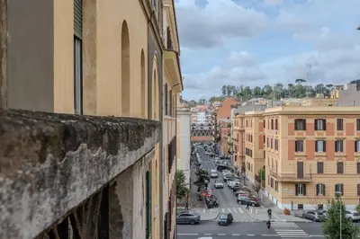 a view of a city street from a building at La CASA DI SABINA in Rome