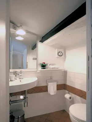 a bathroom with a sink and a toilet at Antiche Residenze Romane - CAMPO DE' FIORI in Rome