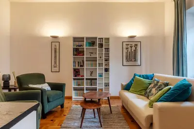 a living room with a couch and two chairs at GuestHost - Trastevere Delightful Apartment in Rome