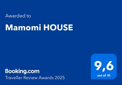 a screenshot of the mannum house website with the text upgraded to mannum house at Mamomi HOUSE in Rome