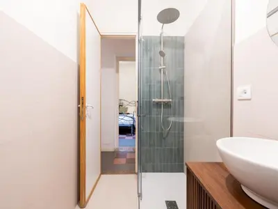 a bathroom with a shower and a sink at The Best Rent - Large apartment a few steps from the Trevi Fountain in Rome