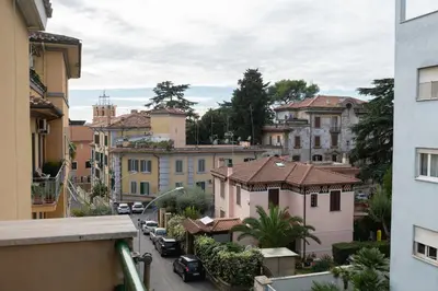 a view from a balcony of a city with buildings at Guest house Sempione da Giulio in Rome